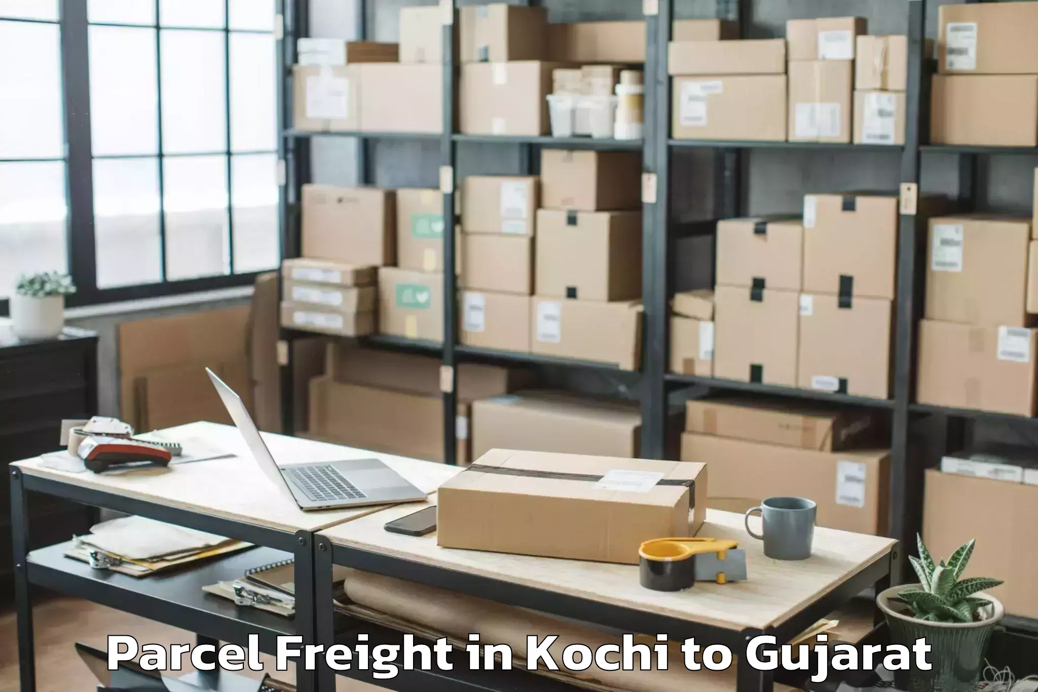 Kochi to Satlasana Parcel Freight Booking